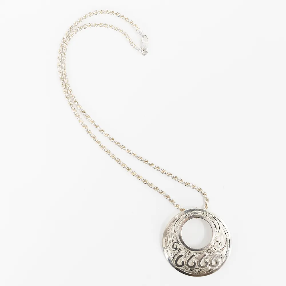 Baru's Peek-a-boo Pendant with Silver Brand